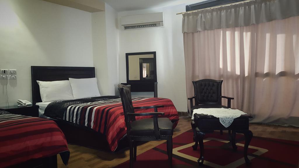 Mandarin Hostel Il Il Cairo Camera foto